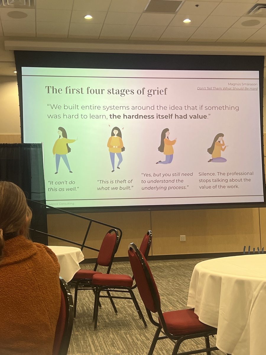 Conference slide titled The first four stages of grief, showing four illustrated figures for denial, anger, bargaining, and silence